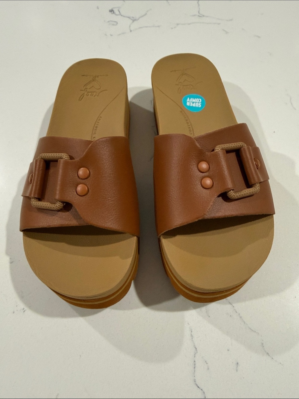 Women’s Reef Cushion Tan Slide Sandals with Buckle Accent